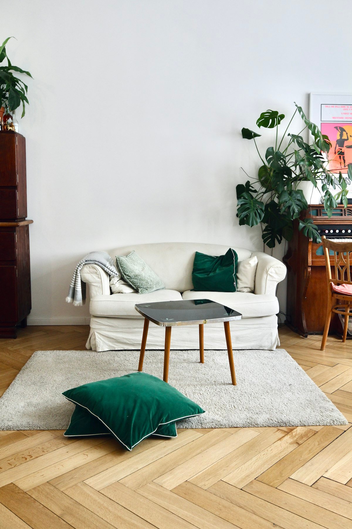 A bright coastal-style living room with a white sofa